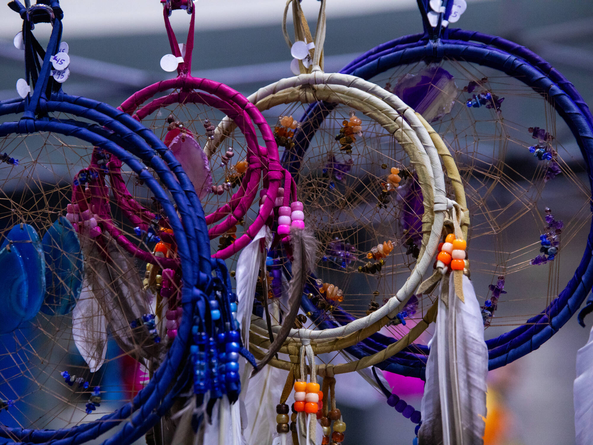 Dreamcatchers hang on display for sale during the annual Walks of Life Powwow on April 12 in the Fieldhouse.